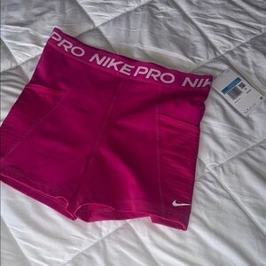 Nike Dri-Fit Women's Fuchsia Athletic Shorts